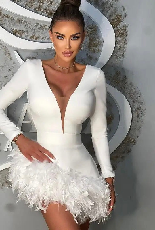 Vestido blanco plumas Kossi